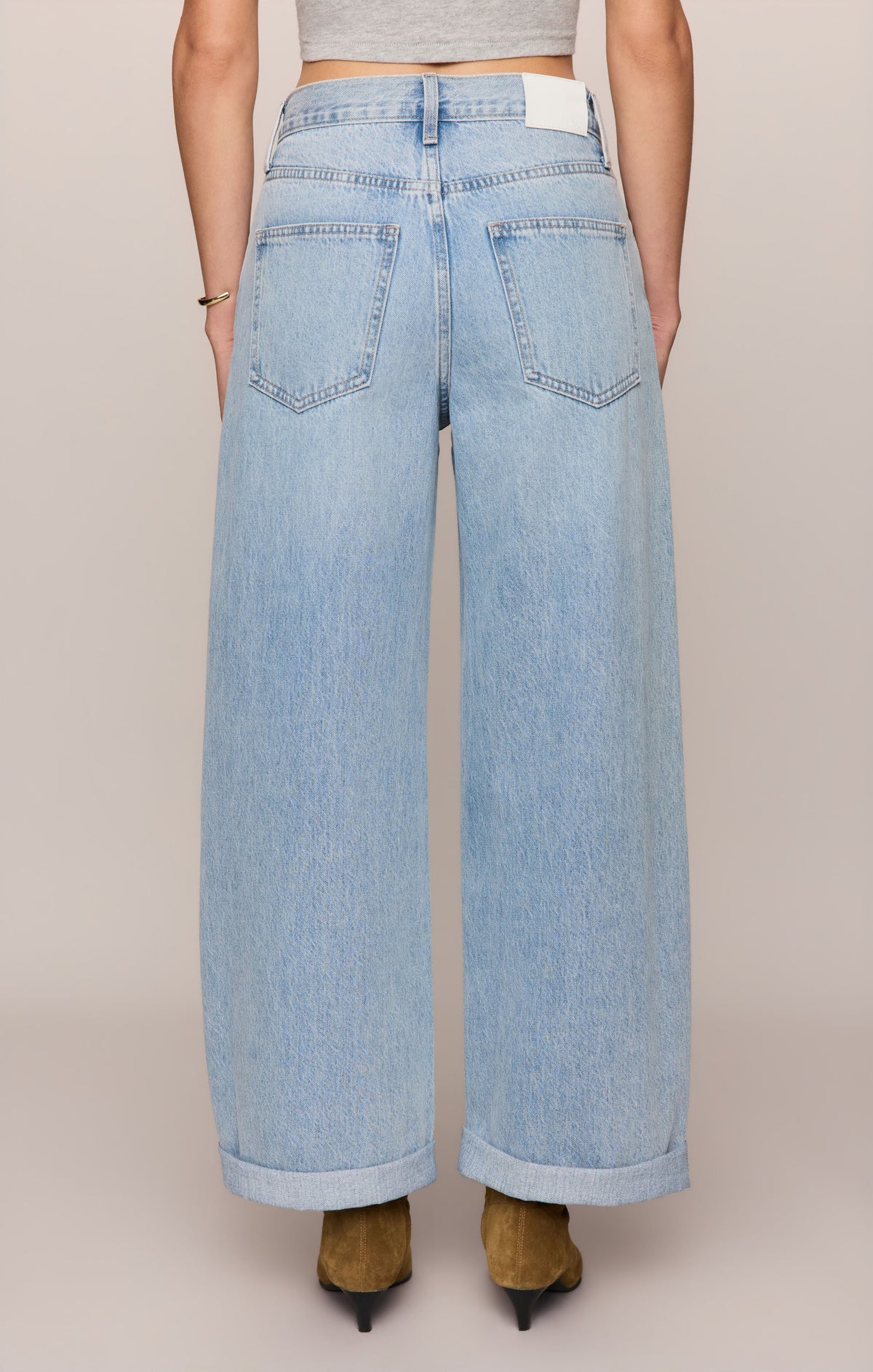 The Show Off High-Rise Bowed Denim